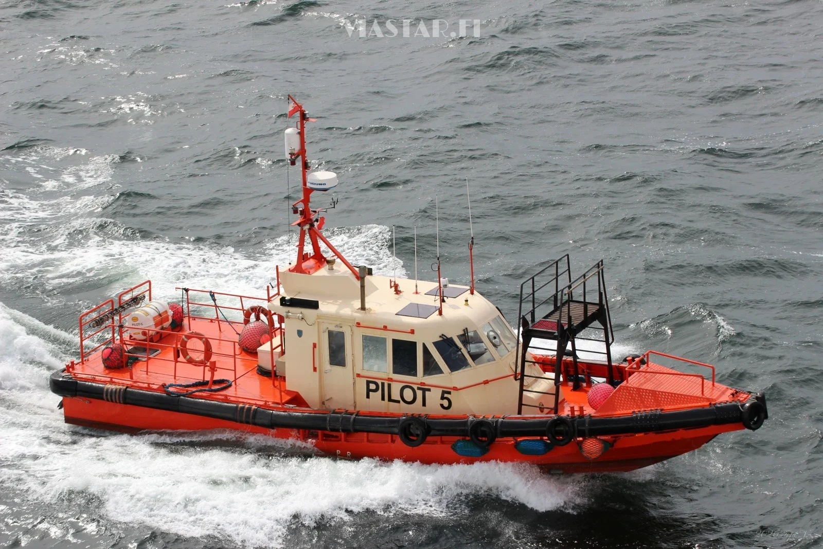 Pilot boat approaching MSC Orchestra in Poland